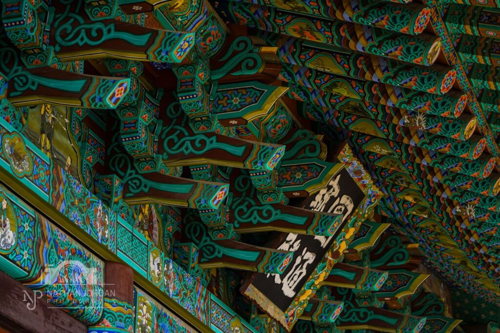 Colorful ceiling paintings of Naksan Temple in Sokcho Korea nathan jordan photography