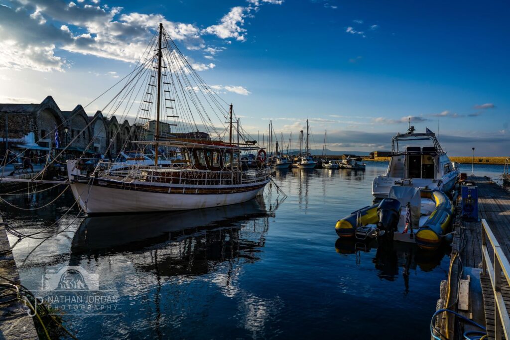 Water reflections in Chania old harbor in late afternoon nathan jordan photography