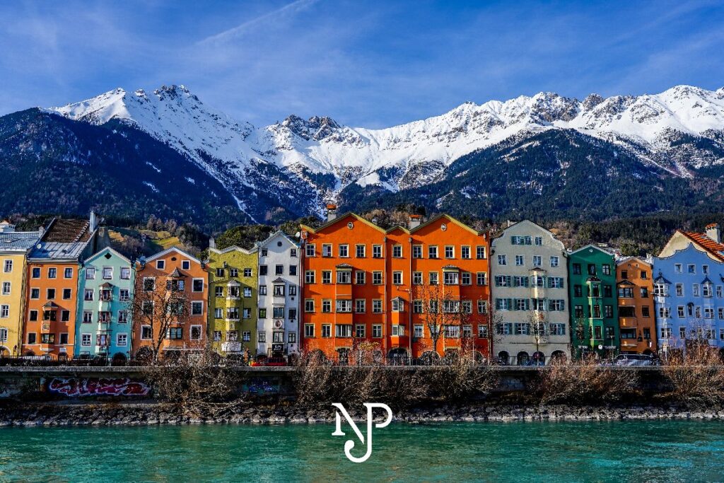 Painted buildings near the river in Innsbruck Austria nathan jordan photography